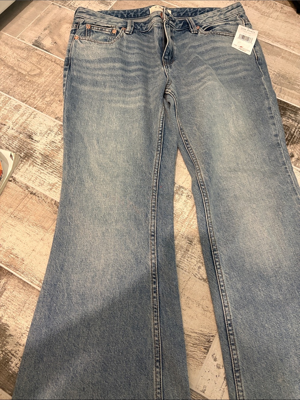 We The Free Light Wash Flare Jeans